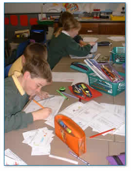 School children using paper